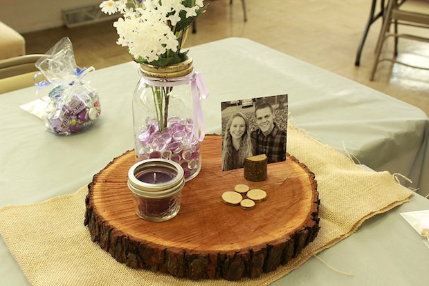 rustic wedding centerpiece with candle and mason jars