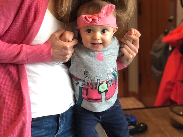 Baby girl in Carhartt baby t-shirt tool belt