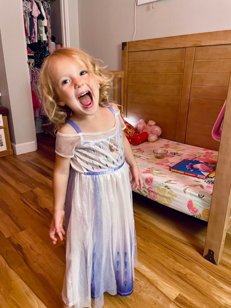 Toddler in Elsa nightgown