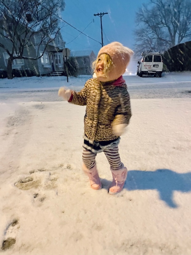 Toddler girl in snow storm